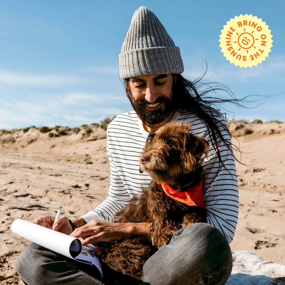 Man with his dog at the beach